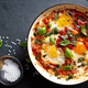 Illustration for article titled How to make shakshuka, the Moroccan stew that says “put an egg on it!”
